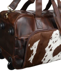 Genuine hair on cowhide accent detail Klassy Cowgirl western luxe rolling duffel chocolate leather