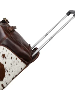 Detail shot of the genuine hair-on cowhide accent on the Klassy Cowgirl Western Luxe Rolling Duffel, highlighting the natural hair texture, unique cowhide pattern, and rich contrast against the chocolate Argentina cow leather body. The natural hair-on cowhide surface delivers bold western character and tactile richness that makes this rolling duffel immediately recognizable as a premium western travel accessory. IMAGE 3 – Wheels and Pull-Out Handle Detail Shot Alt Text: Durable wheels pull out telescoping handle Klassy Cowgirl western luxe rolling duffel rodeo travel Image Title: Klassy Cowgirl Western Rolling Duffel – Durable Wheels and Pull-Out Telescoping Handle Detail Caption: Durable wheels and pull-out telescoping handle on the Klassy Cowgirl Western Luxe Rolling Duffel make heavy rodeo travel loads effortless to move through every airport, arena parking lot, and competition venue. Image Description: Detail view of the durable rolling wheels and pull-out telescoping handle on the Klassy Cowgirl Western Luxe Rolling Duffel (SKU 78316). The two durable wheels and smooth pull-out handle make rolling heavy travel loads effortless through airports, rodeo venues, and barrel racing competition events. Furthermore, the handle tucks neatly into a dedicated zippered pocket when not in use — maintaining the bag's clean western profile during hand and shoulder carrying. IMAGE 4 – Zipper Compartments and Organization Detail Shot Alt Text: Zipper compartments organization pockets Klassy Cowgirl western luxe rolling duffel leather Image Title: Klassy Cowgirl Western Rolling Duffel – Zipper Compartments and Organization Detail Caption: The front zipper compartment and back zipper pocket on the Klassy Cowgirl Western Luxe Rolling Duffel keep daily essentials organized, accessible, and secure through every rodeo road trip and barrel racing travel adventure. Image Description: Detail shot of the zipper compartments and organization pockets on the Klassy Cowgirl Western Luxe Rolling Duffel. The front zipper compartment provides quick access to phones, wallets, and travel documents while the back zipper pocket offers secure, separated storage for frequently needed items. Together with the spacious main compartment, these organization features keep every item in your travel kit accessible and protected throughout every journey. IMAGE 5 – Leather Handles and Shoulder Strap Detail Shot Alt Text: Leather handles removable adjustable shoulder strap Klassy Cowgirl western rolling duffel Argentina leather Image Title: Klassy Cowgirl Western Rolling Duffel – Leather Handles and Removable Shoulder Strap Detail Caption: Sturdy leather handles and a removable adjustable shoulder strap give the Klassy Cowgirl Western Luxe Rolling Duffel three versatile carrying options — adapting instantly to every travel situation and load weight. Image Description: Detail view of the sturdy leather handles and removable adjustable shoulder strap on the Klassy Cowgirl Western Luxe Rolling Duffel (SKU 78316). The premium Argentina cow leather handles provide comfortable hand carrying for shorter distances while the removable adjustable shoulder strap delivers hands-free convenience through busy rodeo venues, airport terminals, and barrel racing competition day check-ins. Together with the rolling wheel system, these three carrying options make this duffel the most versatile western travel bag available. SEO PRODUCT TAGS Klassy Cowgirl western duffel, western luxe rolling duffel, chocolate leather western duffel bag, hair on cowhide rolling duffel, Argentina cow leather duffel, western rolling travel bag, rodeo travel duffel bag, barrel racing travel bag, cowgirl rolling duffel bag, western weekend travel bag, Klassy Cowgirl SKU 78316, western duffel with wheels, pull out handle western duffel, hair on cowhide travel bag, premium western travel bag, cowgirl competition travel gear, western rodeo rolling luggage, chocolate cowhide duffel bag, western lifestyle travel bag, Klassy Cowgirl leather bag, removable shoulder strap western duffel, western duffel multiple compartments, rodeo road trip travel bag, luxury western duffel bag USA, barrel racing competition travel gear1 section of your text is longer than the recommended number of words (300) and is not separated by any subheadings. Add subheadings to improve readability. Improvements (2)Paragraph length: 2 of the paragraphs contain more than the recommended maximum number of words (70). Shorten your paragraphs!Sentence length: 23.9% of the sentences contain more than 20 words, which is more than the recommended maximum of 20%. Try to shorten the sentences. correct these for long description according yoast standards3:22 AMHere is the fully corrected long description addressing all three Yoast flags: LONG DESCRIPTION Klassy Cowgirl Western Luxe Rolling Duffel – Chocolate Argentina Cow Leather | Hair-On Cowhide The Klassy Cowgirl Western Luxe Rolling Duffel delivers premium chocolate Argentina cow leather craftsmanship, genuine hair-on cowhide western character, and smart rolling travel functionality. Klassy Cowgirl designs this extraordinary western rolling duffel for the cowgirl who refuses to compromise between style and practical travel performance. Furthermore, every detail reflects a brand commitment to western luxury that stands out in every arena and airport. As a result, you travel with confidence knowing your bag performs as impressively as it looks. Chocolate Argentina Cow Leather — Premium Western Luxury Built to Last The rich chocolate Argentina cow leather body sets this Klassy Cowgirl rolling duffel apart from every other western travel bag available today. Specifically, Argentina cow leather ranks among the finest leather grades in western goods manufacturing. Furthermore, the rich chocolate tone deepens beautifully with regular use over time. Moreover, Argentina cow leather delivers exceptional durability that synthetic alternatives simply cannot match. Consequently, this chocolate leather western duffel handles frequent rodeo travel and airline baggage handling without cracking or fading. Therefore, every cowgirl who invests in this bag chooses quality that lasts for years. Argentina cow leather features include: Rich chocolate Argentina cow leather body delivering premium western luxury High-grade leather selection ranking among the finest available in western goods Warm chocolate tone that deepens and develops beautiful patina with regular use Exceptional durability withstanding frequent travel and heavy daily use reliably Premium leather construction that synthetic alternatives cannot replicate or match Why Argentina Cow Leather Makes This Duffel Different Not all leather travel bags deliver the same quality. In contrast to standard cowhide or bonded leather alternatives, Argentina cow leather offers superior grain consistency and natural strength. Furthermore, it ages gracefully rather than deteriorating under hard use. Moreover, the leather's natural properties resist abrasion and surface damage effectively. This matters greatly for a bag traveling through airports and rodeo venues regularly. Therefore, cowgirls who choose this Klassy Cowgirl western duffel invest in a bag that improves in character with every mile traveled. Genuine Hair-On Cowhide Accents — A Striking Western Signature Genuine hair-on cowhide covers the front and back of this western luxe rolling duffel. Specifically, natural hair-on cowhide carries its own unique pattern and texture. Furthermore, no two bags look exactly alike — making every duffel a genuinely one-of-a-kind western piece. Moreover, the hair-on cowhide surface adds a tactile richness that flat leather cannot deliver. Consequently, this duffel draws admiring attention everywhere it travels. In addition, compliments follow this bag from airport terminals to rodeo grandstands across America. Hair-on cowhide features include: Genuine hair-on cowhide front and back creating a bold, natural western statement Unique natural pattern ensuring every bag carries its own one-of-a-kind appearance Tactile richness that flat leather and synthetic materials cannot replicate Natural western character that deepens and develops with every trip and event Immediate visual impact drawing attention and compliments in every travel setting How the Leather and Cowhide Combination Creates a Showstopping Bag The chocolate Argentina cow leather and genuine hair-on cowhide create a visual contrast that defines the Klassy Cowgirl aesthetic. In particular, the smooth chocolate leather body provides a polished, structured foundation. Furthermore, the natural cowhide accents add raw western character that keeps the bag from feeling overly formal. Moreover, this combination travels beautifully across different settings and occasions. It looks equally at home at a high-end rodeo event and on a casual weekend getaway. Therefore, this hair-on cowhide rolling duffel delivers genuine versatility that few western travel bags can match. Spacious Main Compartment — Smart Organization for Every Trip The spacious main compartment with a top zipper closure makes packing simple, fast, and organized. Specifically, the generous interior accommodates competition clothing, boot bags, and personal care essentials. Furthermore, the smooth top zipper closure opens and closes reliably through thousands of travel cycles. Moreover, the front zipper compartment provides quick access to smaller daily essentials. In addition, the back zipper pocket adds a secure, separated storage option for frequently needed items. Consequently, every item in your travel kit stays organized, accessible, and protected throughout every journey. Organization features include: Spacious main compartment accommodating full competition and weekend travel packing Top zipper closure opening and closing reliably through thousands of travel cycles Front zipper compartment providing quick access to daily essentials and small items Back zipper pocket offering secure, separated storage for frequently needed items Smart organization layout keeping every item accessible and protected throughout travel Three Carrying Options — Roll It, Carry It, Shoulder It This Klassy Cowgirl western rolling duffel gives you three distinct carrying options. Specifically, two durable wheels and a pull-out telescoping handle make rolling heavy loads effortless. Furthermore, the handle tucks neatly into a dedicated zippered pocket when not in use. Moreover, sturdy leather handles allow comfortable hand carrying for shorter distances. In addition, the removable adjustable shoulder strap provides hands-free convenience in busy venues. Therefore, no matter how your travel day unfolds, this duffel adapts instantly to every situation. Carrying options include: Two durable wheels making heavy loads effortless to roll through any surface Pull-out telescoping handle tucking neatly into a dedicated zippered pocket when stored Sturdy leather handles providing comfortable hand carrying for shorter distances Removable adjustable shoulder strap delivering hands-free convenience anywhere Three versatile carrying modes adapting instantly to every travel situation and load Why the Rolling Wheel System Changes Everything Heavy rodeo gear adds up fast. Consequently, a reliable rolling system transforms a burdensome load into an effortless travel experience. Furthermore, the two durable wheels on this western rolling duffel handle airport floors, arena parking lots, and uneven terrain with equal ease. Moreover, the pull-out handle extends smoothly and locks securely at a comfortable rolling height. In addition, it retracts fully into its dedicated pocket — keeping the bag looking clean and structured at all times. Therefore, rolling travel has never felt more effortless or looked more western stylish. Built for the Cowgirl Who Is Always on the Move Klassy Cowgirl designs this western luxe rolling duffel specifically for the active, competitive cowgirl who travels constantly. Furthermore, every feature reflects a deep understanding of how barrel racers and rodeo competitors actually travel. Moreover, the premium leather construction and thoughtful organization make this the only travel duffel a serious western competitor needs. In addition, the bag transitions seamlessly from competition travel to weekend getaways without missing a beat. Consequently, it serves every occasion with equal style and functionality. Therefore, this duffel truly earns its place as the ultimate western travel companion for every cowgirl on the move. Klassy Cowgirl Western Luxe Rolling Duffel – Full Specs Brand: Klassy Cowgirl SKU: 78316 Type: Western Luxe Rolling Duffel Bag Body Material: Chocolate Argentina Cow Leather Accent Material: Genuine Hair-On Cowhide Front and Back Main Compartment: Spacious with Top Zipper Closure Front Pocket: Zipper Compartment Back Pocket: Zipper Pocket Carrying Options: Leather Handles, Removable Adjustable Shoulder Strap, Two Wheels with Pull-Out Handle Handle Storage: Pull-Out Handle Tucks into Dedicated Zippered Pocket Ideal For: Rodeo Travel, Weekend Getaways, Barrel Racing Events, Air Travel Why Cowgirls Choose the Klassy Cowgirl Western Luxe Rolling Duffel Klassy Cowgirl builds western travel gear for competitors who demand the very best. Furthermore, the Western Luxe Rolling Duffel delivers that standard in every stitch, every zipper, and every inch of premium leather. Moreover, few travel bags combine genuine luxury leather construction with practical rolling functionality at this level of western sophistication. Additionally, the bag serves equally well for rodeo road trips, airline travel, and casual weekend getaways. Consequently, it delivers outstanding value across every travel occasion a competitive cowgirl faces. Therefore, this duffel stands as one of the most versatile and stylish western travel investments available today. Here is why serious traveling cowgirls choose the Klassy Cowgirl Western Luxe Rolling Duffel: Premium Argentina cow leather delivering luxury durability that synthetic bags cannot match Genuine hair-on cowhide accents creating a one-of-a-kind western statement on every trip Three versatile carrying modes adapting to every travel situation and load weight Smart multi-pocket organization keeping every item accessible and secure throughout travel Durable wheels and pull-out handle making heavy loads effortless to move anywhere Removable shoulder strap providing hands-free convenience in busy competition venues Therefore, when you choose the Klassy Cowgirl Western Luxe Rolling Duffel, you choose a bag that travels as hard as you compete and looks as good as your best competition tack doing it. Fast Shipping on Every Klassy Cowgirl Western Luxe Rolling Duffel Order Every order of this Klassy Cowgirl western rolling duffel processes within 24 hours — excluding weekends and holidays. Moreover, once your bag ships, a FedEx tracking number arrives in your email within 24–48 hours. In addition, expedited shipping gets your western travel bag to you even faster when your next rodeo road trip approaches quickly. Here is what to expect with every order: Processing: All orders confirmed and processed within 24 hours of placement East Coast and Midwest: Delivery in 2–4 business days after leaving the warehouse West of the Rockies: Delivery in 3–5 business days Expedited shipping: Ships next business day — sometimes same day Tracking: FedEx tracking number emailed within 24–48 hours of dispatch Addresses: Physical addresses only — no P.O. Boxes accepted International orders: Ships on the same timeline with VAT and import fees handled by local customs Returns: Hassle-free returns accepted within 30 days — no questions asked Questions about your order? Contact us directly at info@barrelracingsaddles.com and our team responds fast. Frequently Asked Questions – Klassy Cowgirl Western Luxe Rolling Duffel Full answers to all questions below live on our FAQ page. Click any question to read the complete answer. Q: What leather does Klassy Cowgirl use in this rolling duffel? A: Klassy Cowgirl crafts this duffel from rich chocolate Argentina cow leather. Furthermore, genuine hair-on cowhide accents cover the front and back — making every bag a genuinely one-of-a-kind western piece. Q: Is this duffel suitable for airline travel? A: Yes. The durable wheels, pull-out telescoping handle, and sturdy construction make this western rolling duffel ideal for airline travel. Furthermore, multiple zipper compartments keep essentials organized through every stage of the journey. Q: How many carrying options does this duffel offer? A: This duffel offers three versatile carrying modes. Specifically, you roll it using the two durable wheels and pull-out handle, carry it by the sturdy leather handles, or wear it hands-free using the removable adjustable shoulder strap. Q: Where does the pull-out handle store when not in use? A: The pull-out telescoping handle tucks neatly into a dedicated zippered pocket. Therefore, the bag maintains its clean western profile when you switch to hand carrying or shoulder strap mode. Q: How many compartments does this western duffel bag have? A: This duffel features three accessible compartments. Specifically, a spacious main compartment, a front zipper compartment, and a back zipper pocket. Consequently, everything stays organized and immediately accessible throughout every journey. Q: Is the shoulder strap removable on this Klassy Cowgirl duffel? A: Yes. The shoulder strap is fully removable and adjustable. Furthermore, removing it gives the bag a clean profile for hand carrying while attaching it delivers hands-free convenience through busy venues. Q: How long does shipping take on this Klassy Cowgirl western rolling duffel? A: Orders process within 24 hours. East Coast and Midwest customers receive delivery in 2–4 business days. Similarly, customers west of the Rockies receive delivery in 3–5 business days. Expedited options ship the next business day. Q: Can I return this duffel if it does not meet my expectations? A: Yes. We offer hassle-free returns within 30 days of purchase. Furthermore, contact us at info@barrelracingsaddles.com and our team resolves your concern fast. Looking for more premium western bags and travel gear for your next rodeo road trip? Browse the full collection of bags and travel gear and find your perfect western travel companion today.