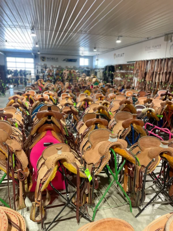 Western saddles displayed for sale in a tack shop